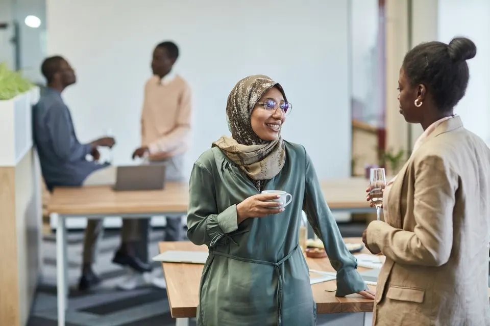 People from different backgrounds talking together.